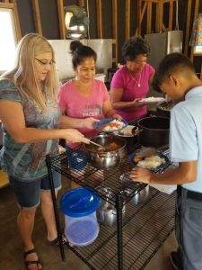 Serving lunch provided by the church to school children in Santa Elena.