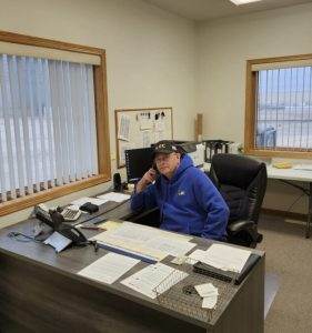 Vern Toohey seating in an office chair